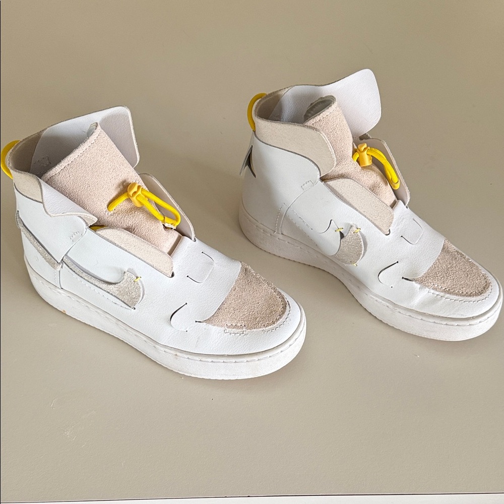 Nike Women's White and Beige High-Top Sneakers with Yellow Accent